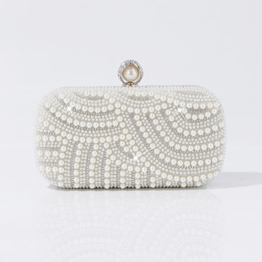Pearl clutch with crystal clasp close-up