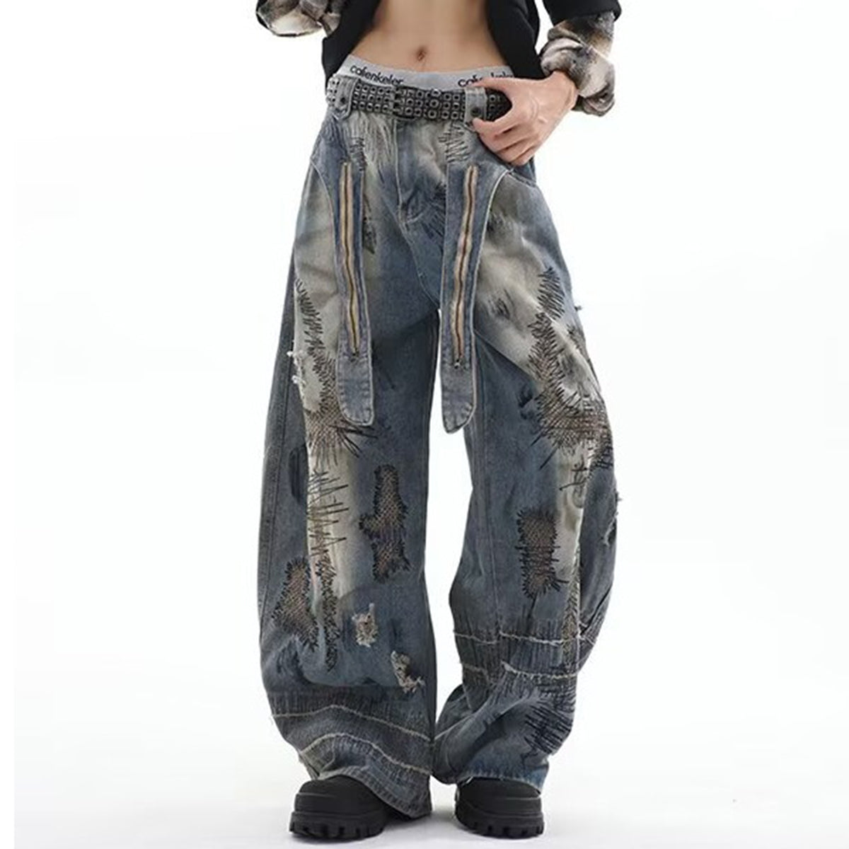 Vintage washed oversized baggy jeans with distressed patchwork