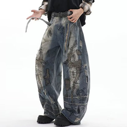 Loose fit blue denim jeans with artistic patch details