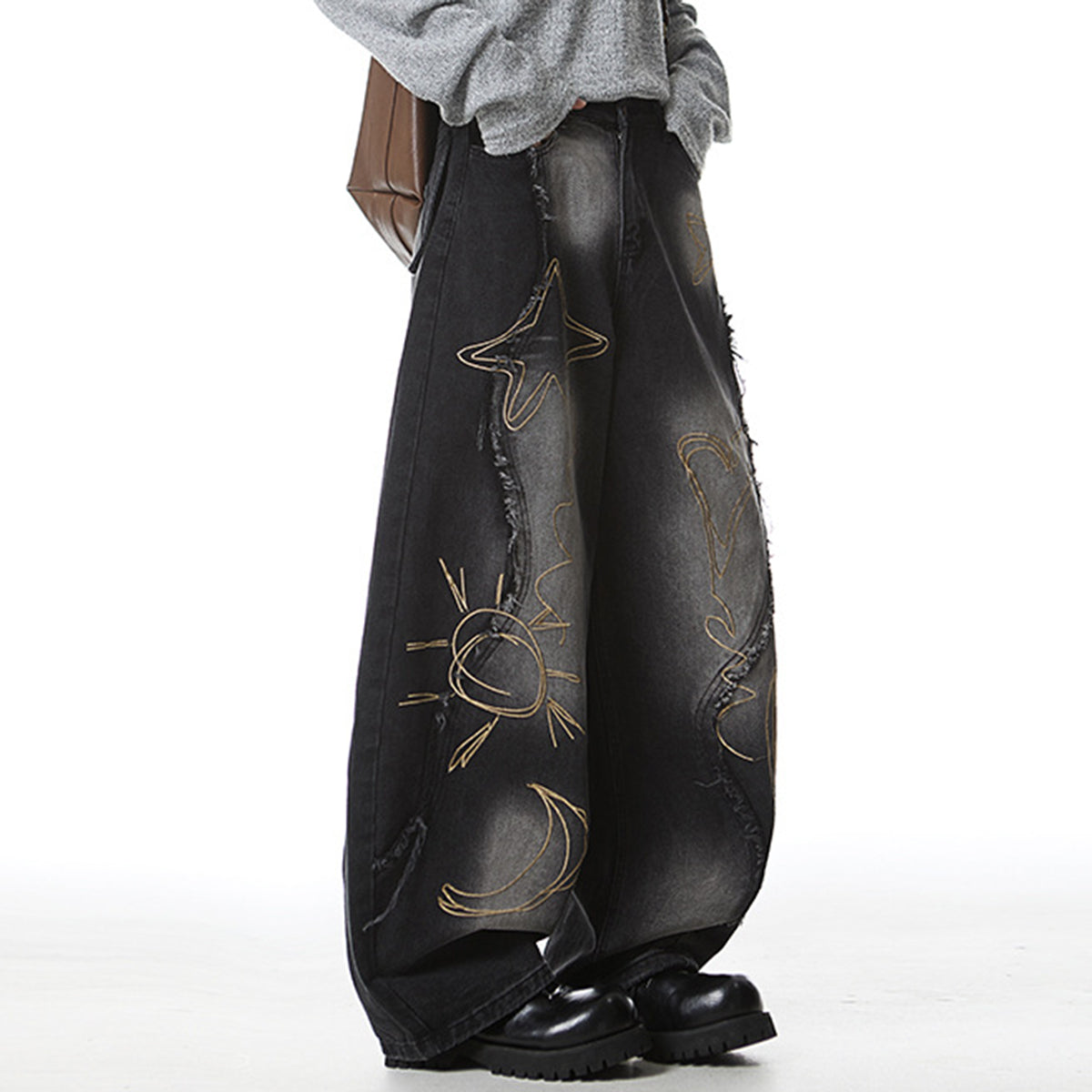 Vintage blue denim pants with graffiti style embroidery