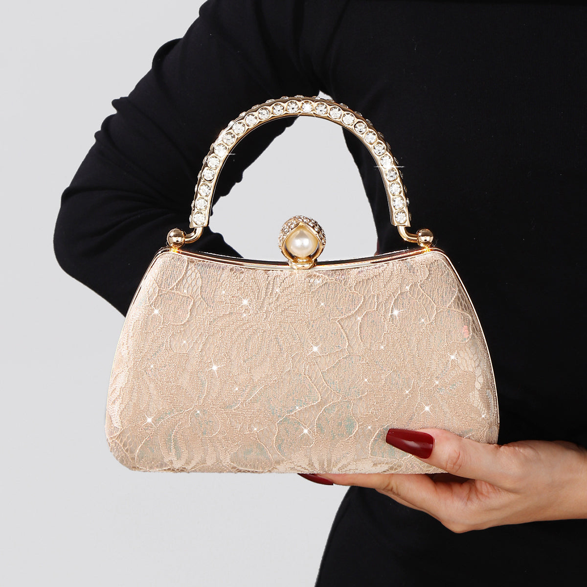 Formal party purse featuring pearl clasp closure