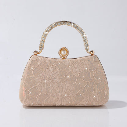Elegant embroidered lace evening bag with rhinestone handle