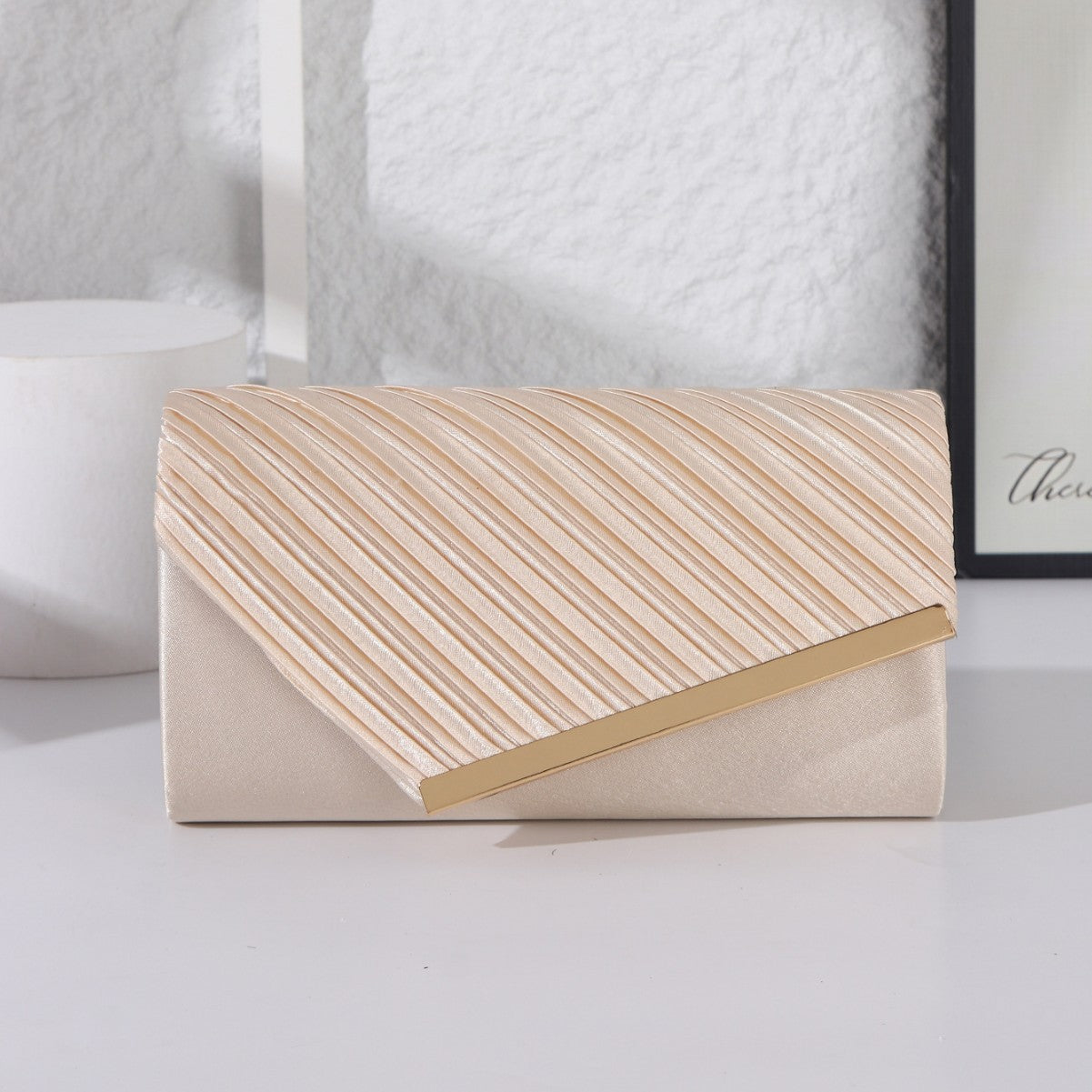 Champagne gold pleated satin evening clutch bag