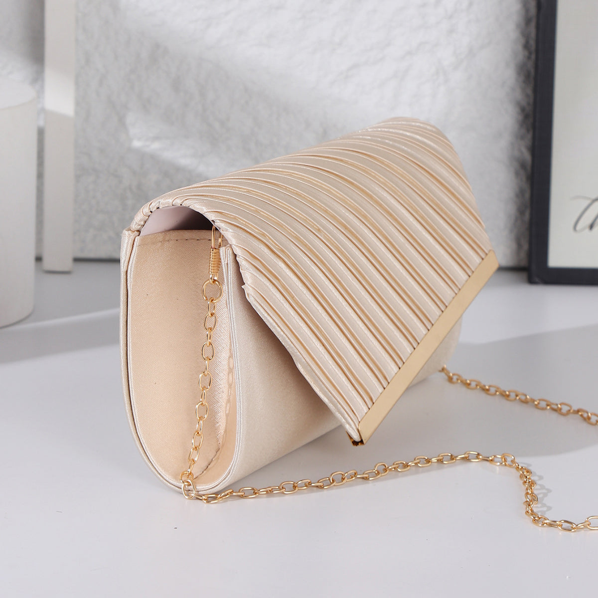 Lightweight satin evening bag with metallic trim