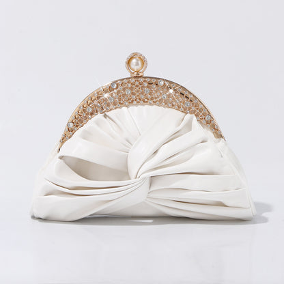 Elegant soft gathered evening bag with rhinestone frame