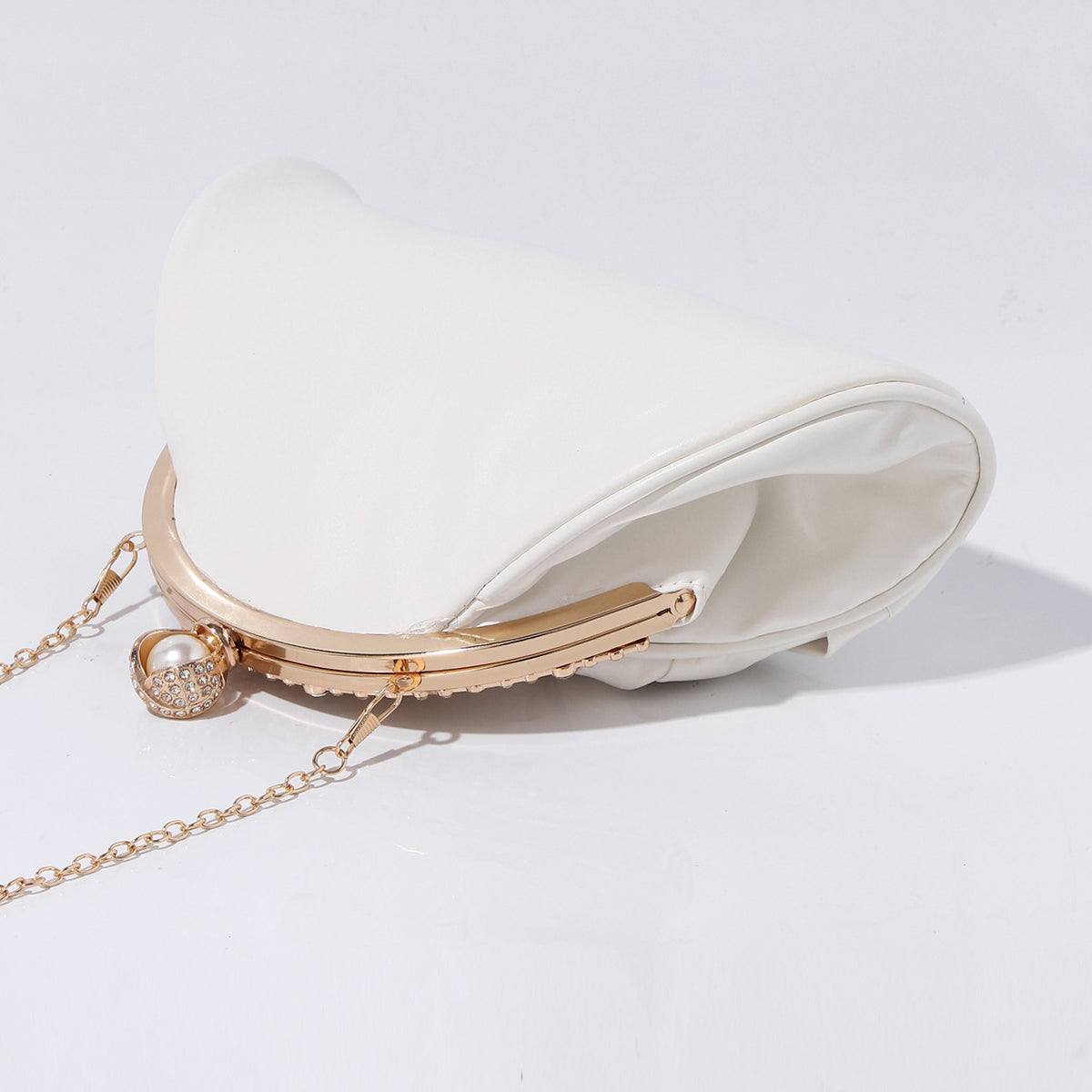 Luxury gathered evening handbag with pearl clasp