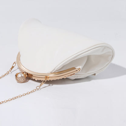 Luxury gathered evening handbag with pearl clasp