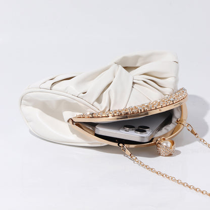 Bridal evening bag with elegant pearl-inspired closure
