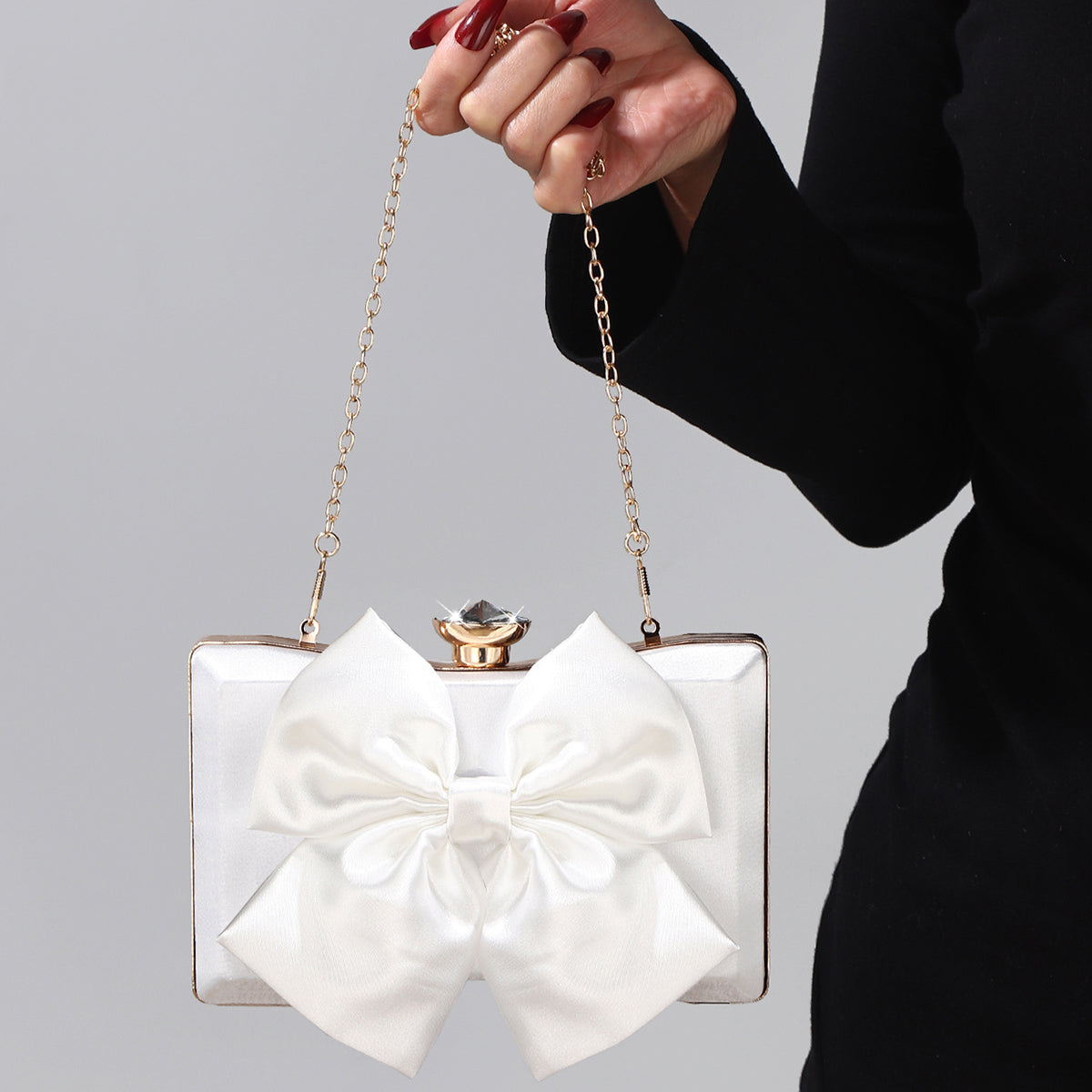 White satin handbag for cocktail party