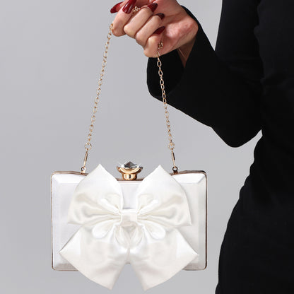White satin handbag for cocktail party