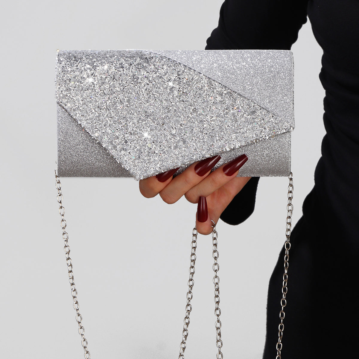Modern envelope evening purse in silver glitter