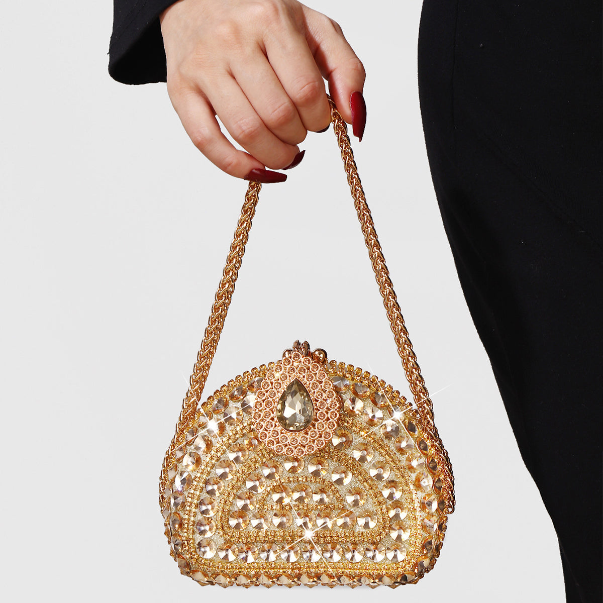 Sparkling rhinestone evening purse on white background
