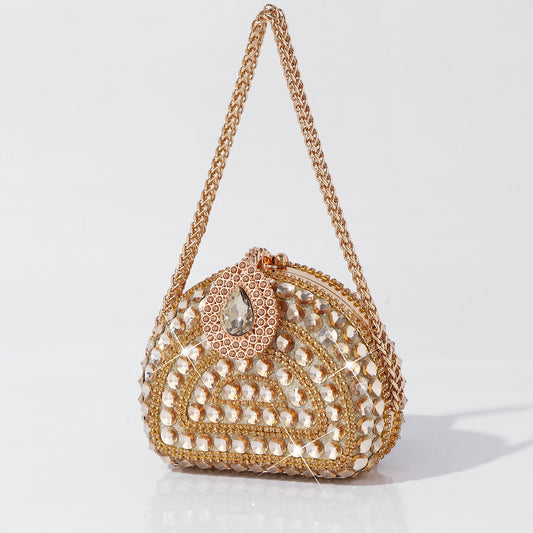 Elegant women's gold rhinestone evening purse with top handle