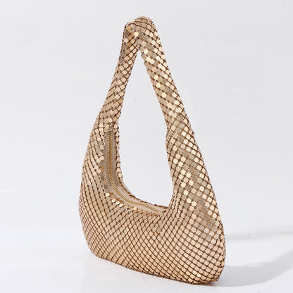 Metallic gold evening handbag close up detail