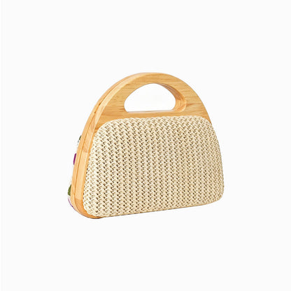 Handmade straw evening bag with botanical embroidery