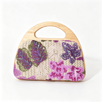 Women's woven straw handbag with natural wood frame