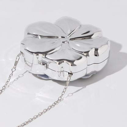 Silver flower-shaped acrylic handbag with chain strap