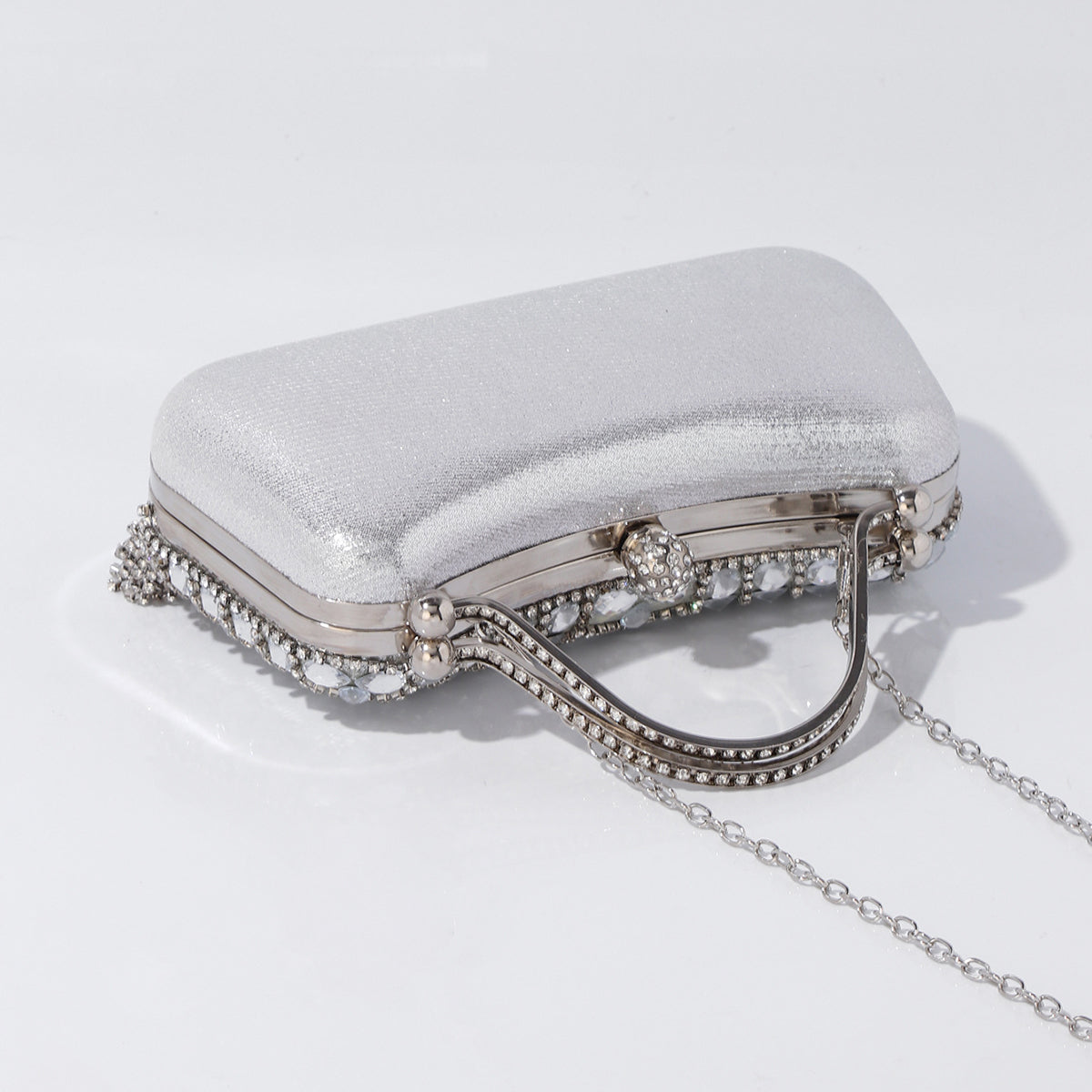 Silver evening handbag with rhinestone embellishments
