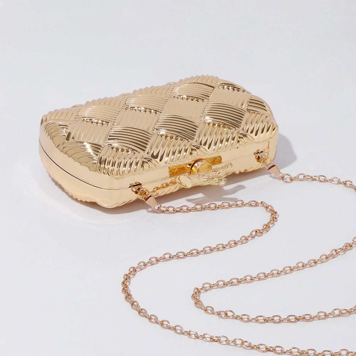 Women's metallic gold hard case evening handbag