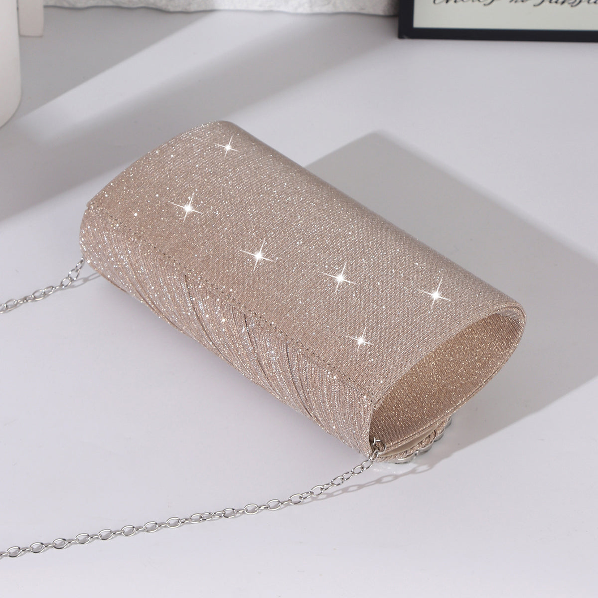 Women's glitter clutch bag with crystal embellishment