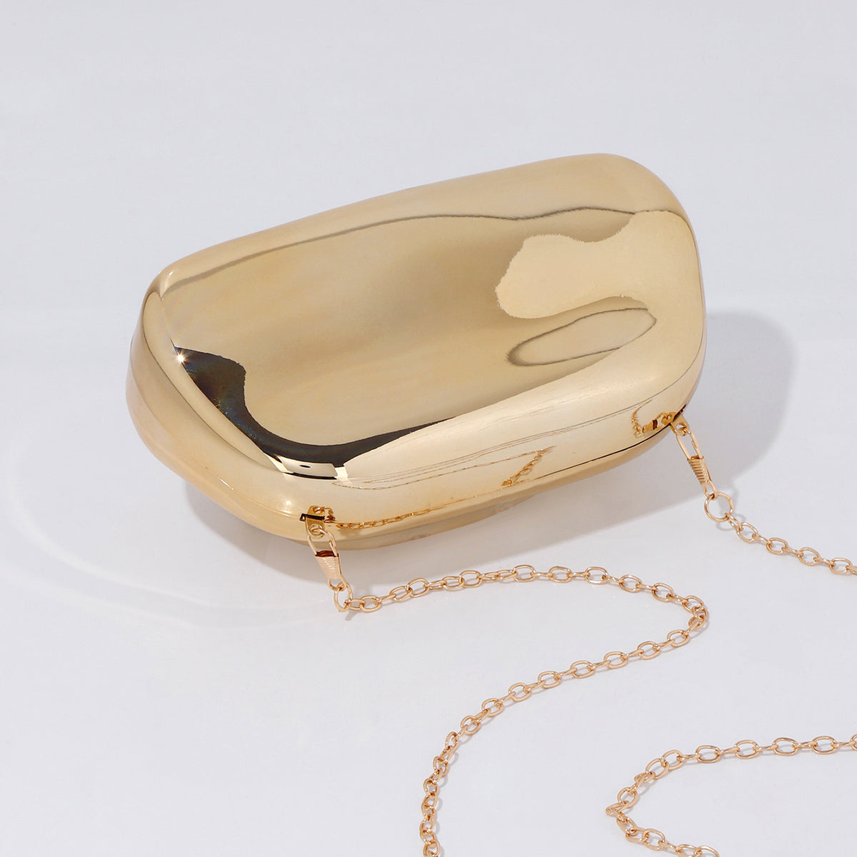 Modern hard shell acrylic clutch purse in gold finish