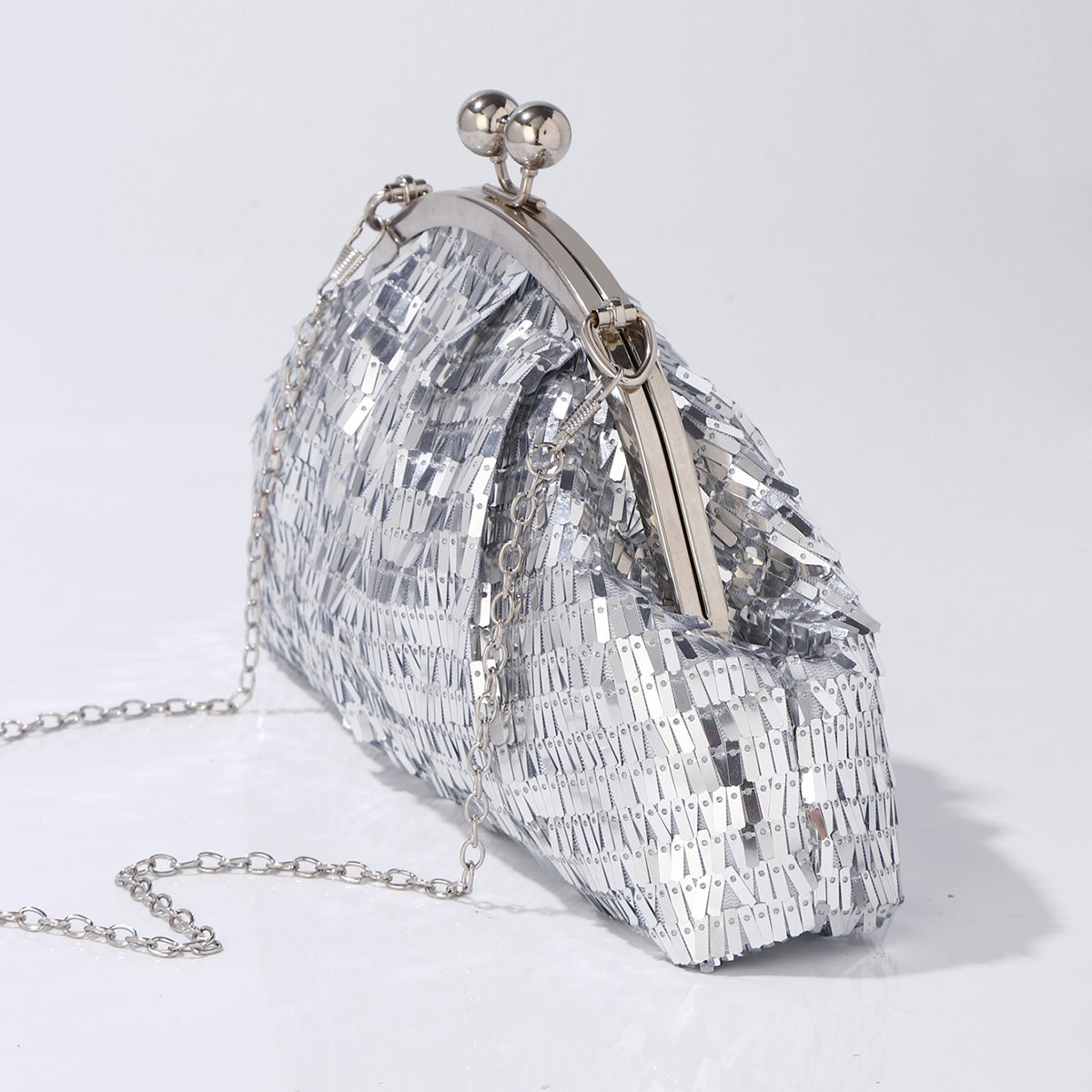 Sparkling silver evening handbag with cloud shape