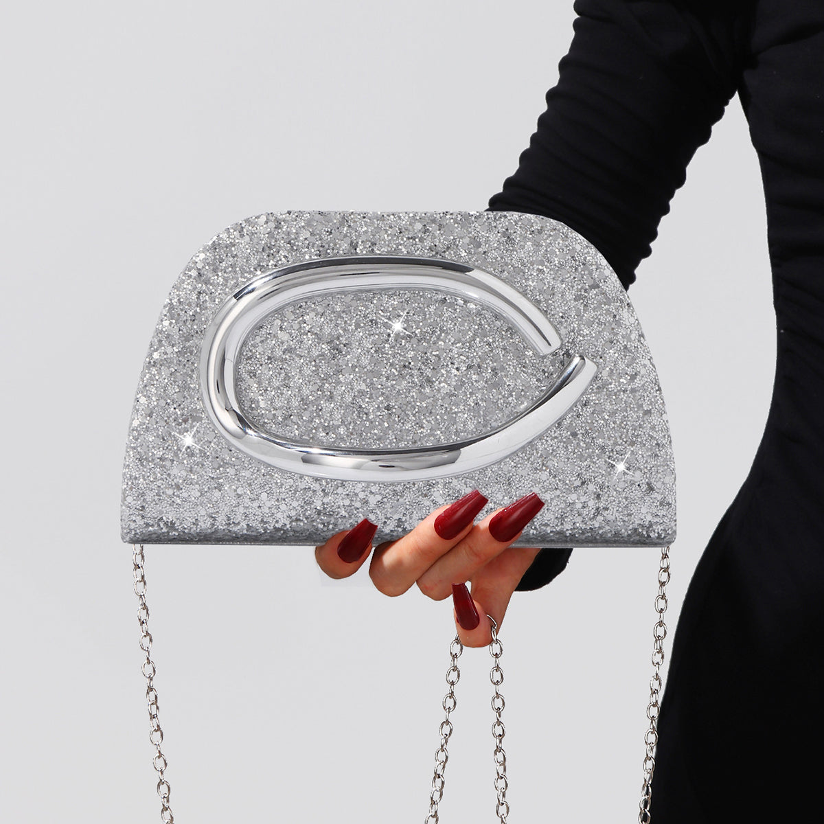 Fashion glitter handbag with sculptural handle