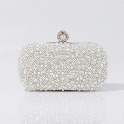 Pearl beaded clutch size comparison with smartphone
