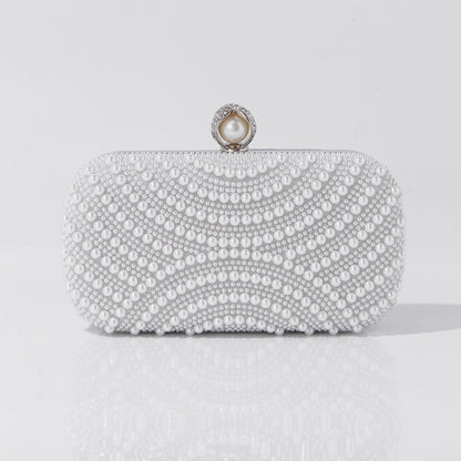 Compact pearl clutch bag with luxury design