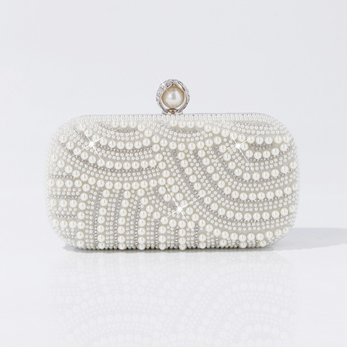 Pearl clutch with crystal clasp close-up