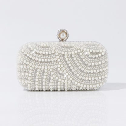 Pearl clutch with crystal clasp close-up