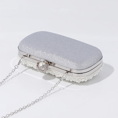Luxury evening bag with pearl and crystal detailing